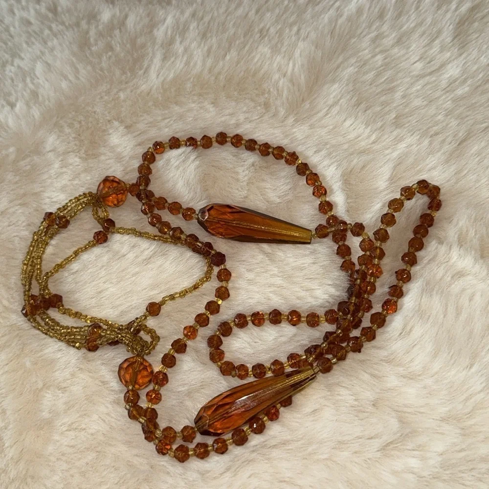 Pretty long amber/ brown colored beaded necklace boho hippie western